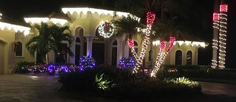 Colorful outdoor residential Christmas lighting.